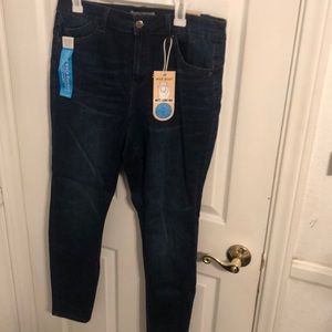 High rise skinny jeans, dark denim.